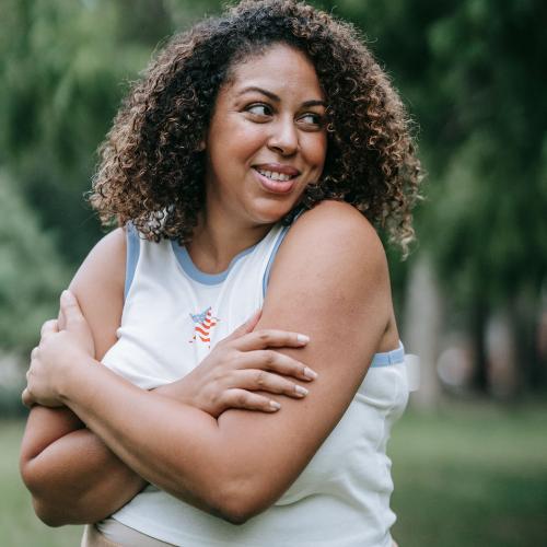 women hugging herself