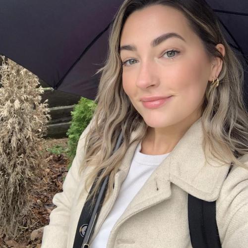 jessica under an umbrella in nature